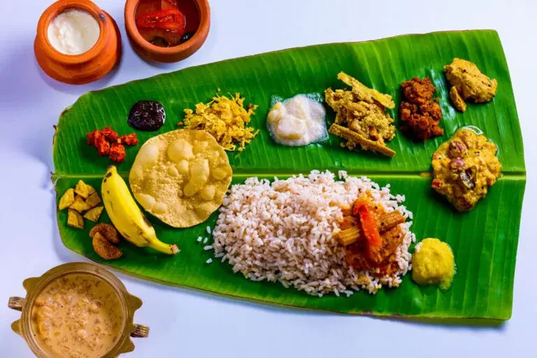 Traditional Kerala sadya served on banana leaf
